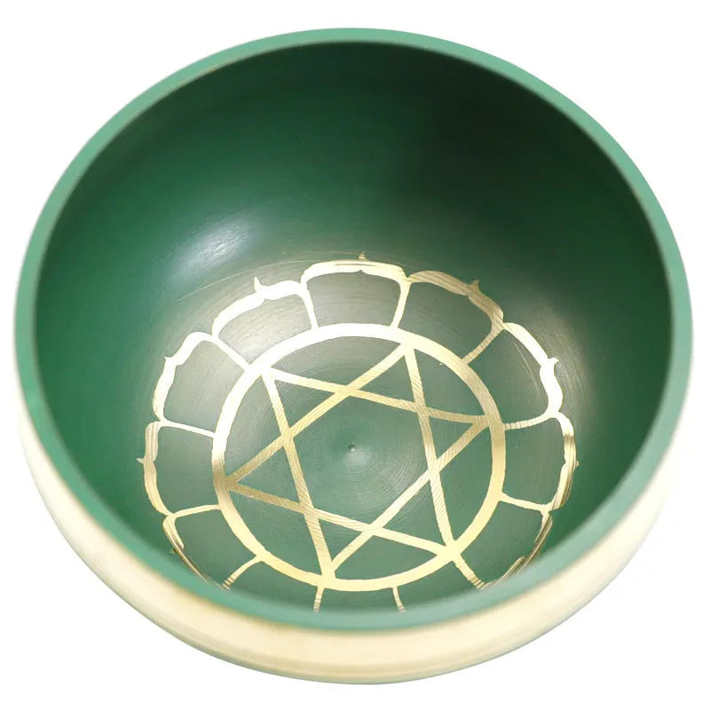 Seven colourful handmade Himalayan-style bowl percussion instruments arranged by size and colour