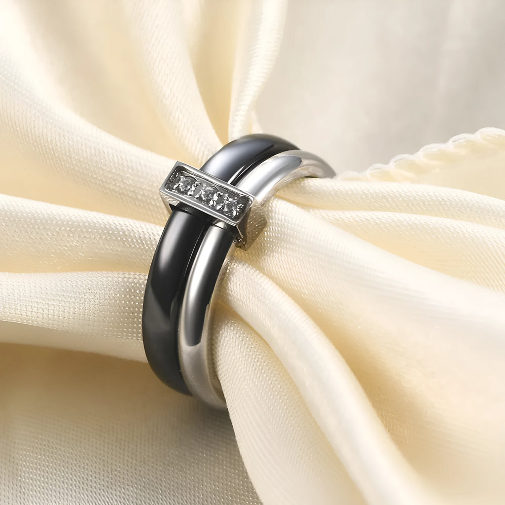 Women's glossy ceramic ring with geometric zirconium inlay in golden white or steel black colour