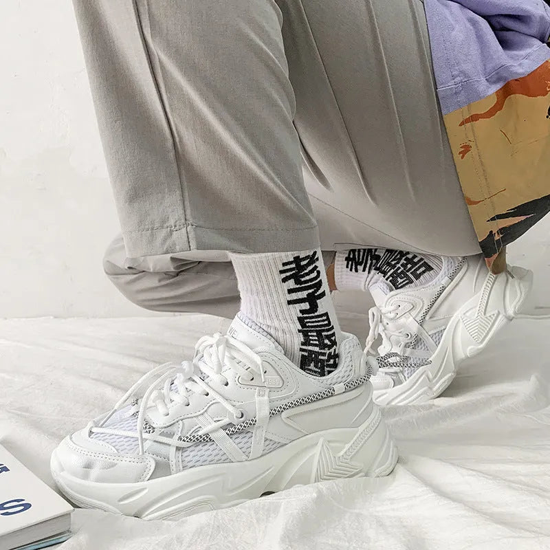 Men's white Korean style platform dad shoes with lace-up front on a neutral background.