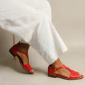 Red women's plus size sandals with buckle strap and herringbone toe holder design