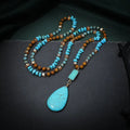 Blue turquoise water drop pendant necklace with mixed gem inlay on a long ball bead chain