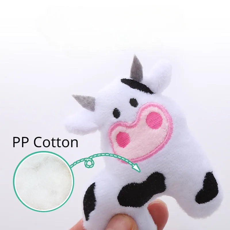 Plush cat toy shaped like a cow, a parrot, or a crocodile with catnip for bite-resistant interactive play.