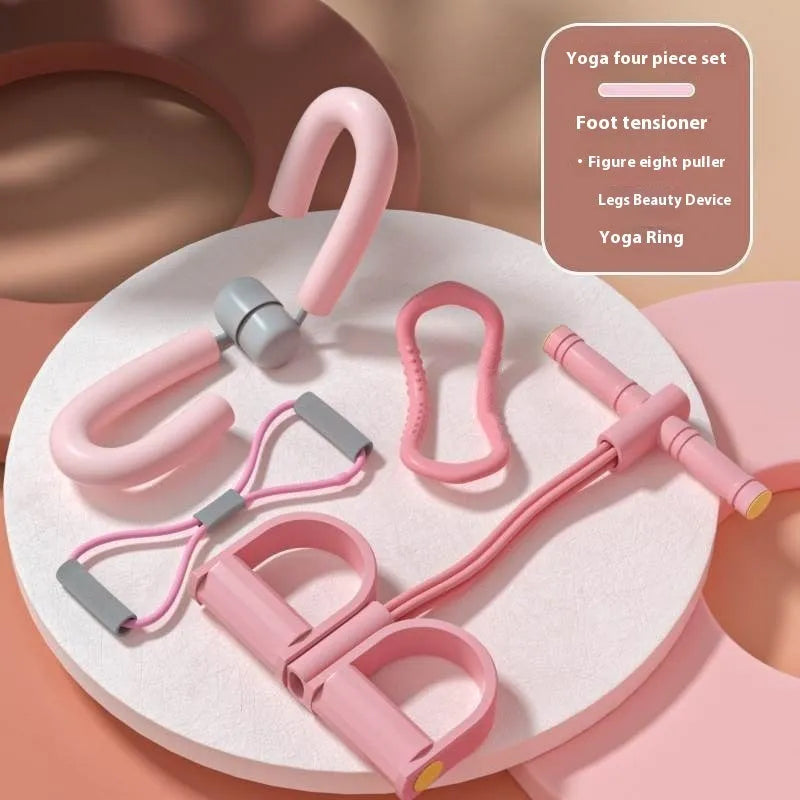 Yoga four piece set showing leg stretching device, pedal exerciser, yoga ring, and tension rope for home fitness training