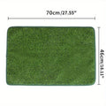 Washable artificial grass pet training mat for dogs and cats on a tiled floor.