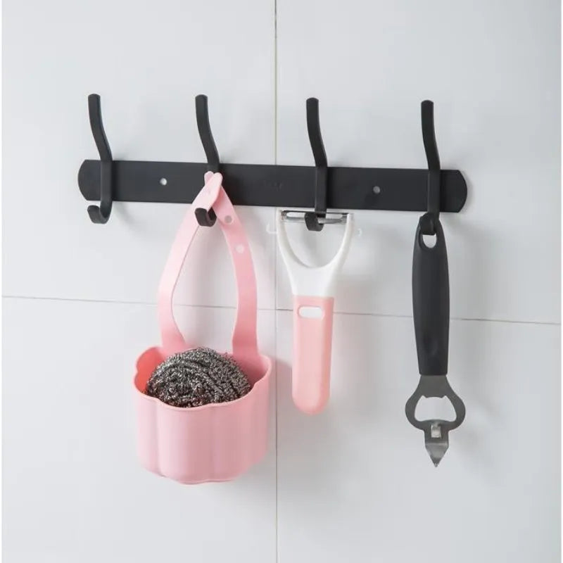 Plastic sink drain basket in dark blue colour showing 20cm length and 10cm width dimensions