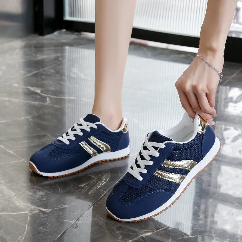 Blue women's casual shoes with cross shoulder straps and rubber soles