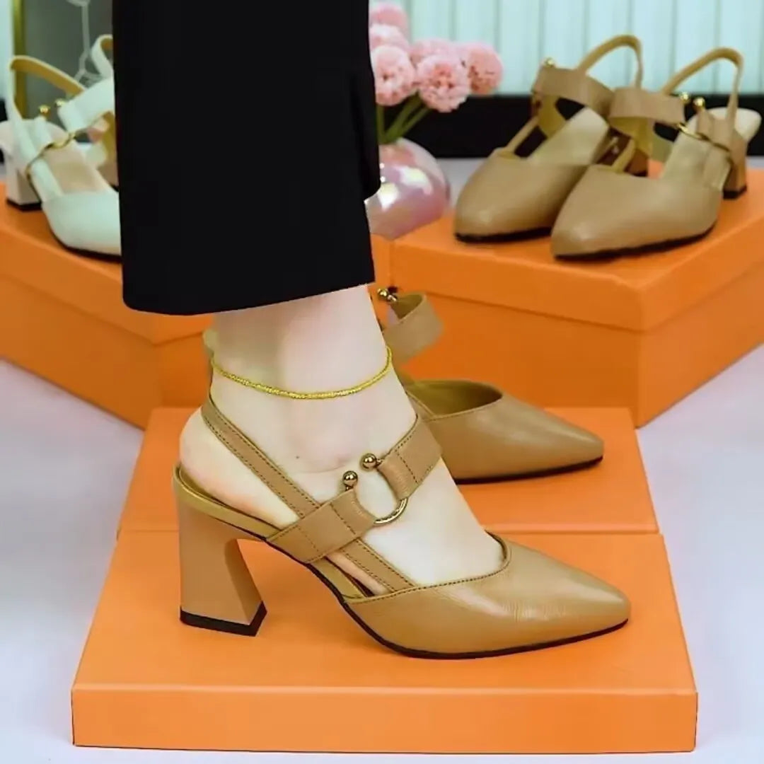 Women's apricot coloured leather sandals with a chunky high heel, closed toe, and closed back strap.