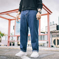 Men's loose fit straight leg casual jeans in dark blue cotton fabric