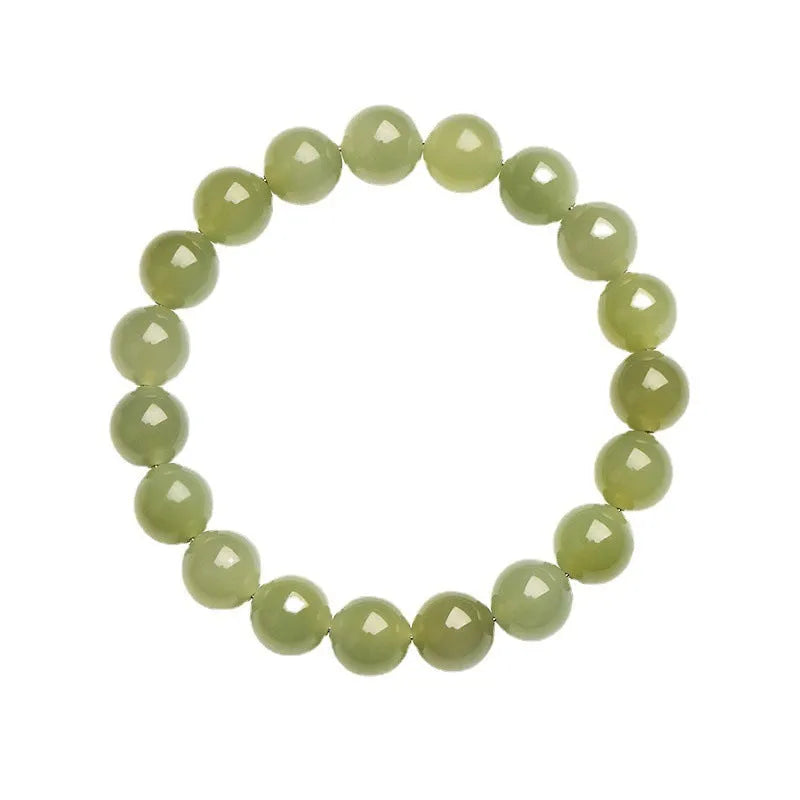 Hetian jade ball bracelet with spherical polished beads in clear colour tones