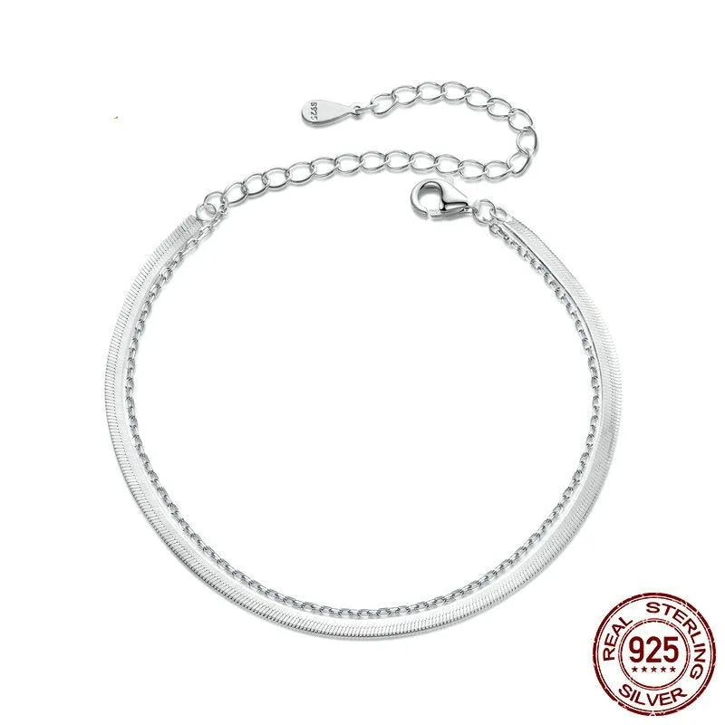 S925 sterling silver double-layer bracelet with electroplated finish, BSB193 colour, on female wrist against neutral background