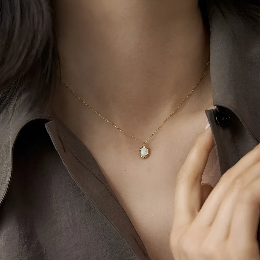 S925 sterling silver pendant necklace with geometric oval design and 14K gold plating