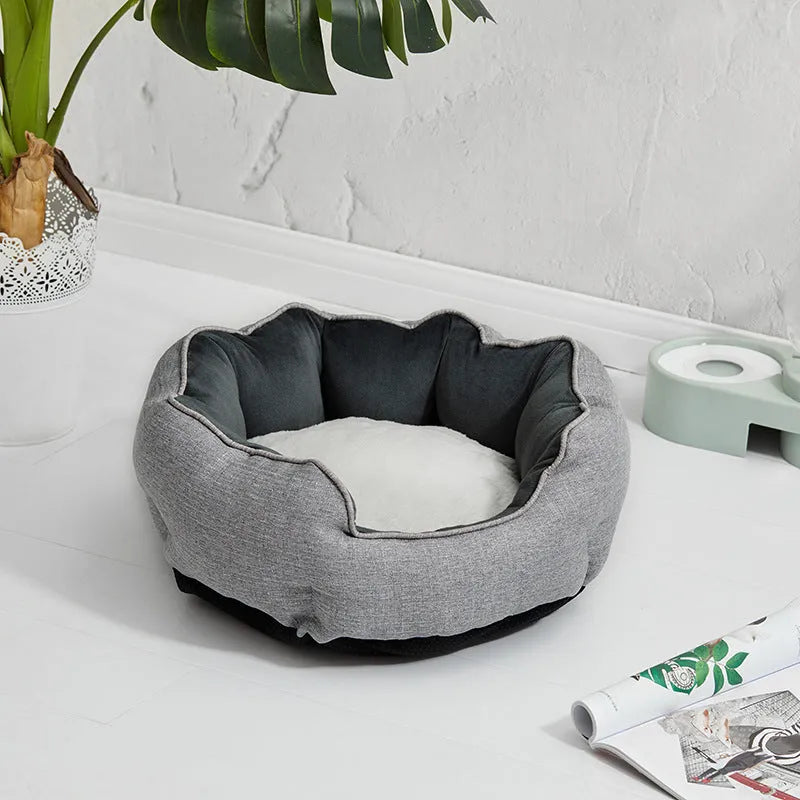 Blue octagonal pet bed with raised sides and a removable mat, for a small dog or cat.