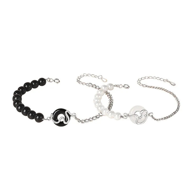 925 sterling silver couple bracelet with safe buckle, snake zodiac design, and obsidian pearl details in New Chinese style.