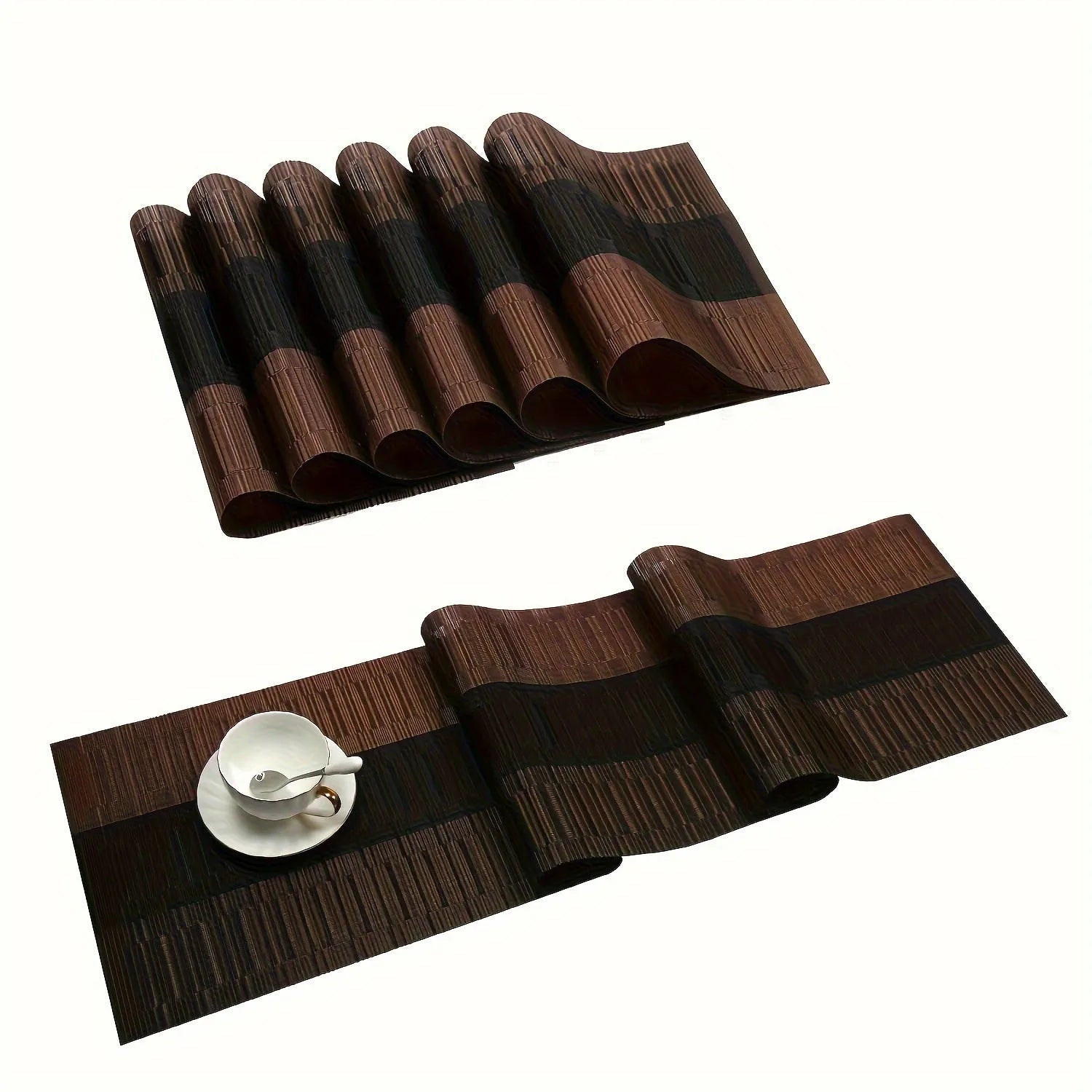 Modern non-slip PVC dish mat with gradient bamboo pattern in black, placed on a wooden dining table.