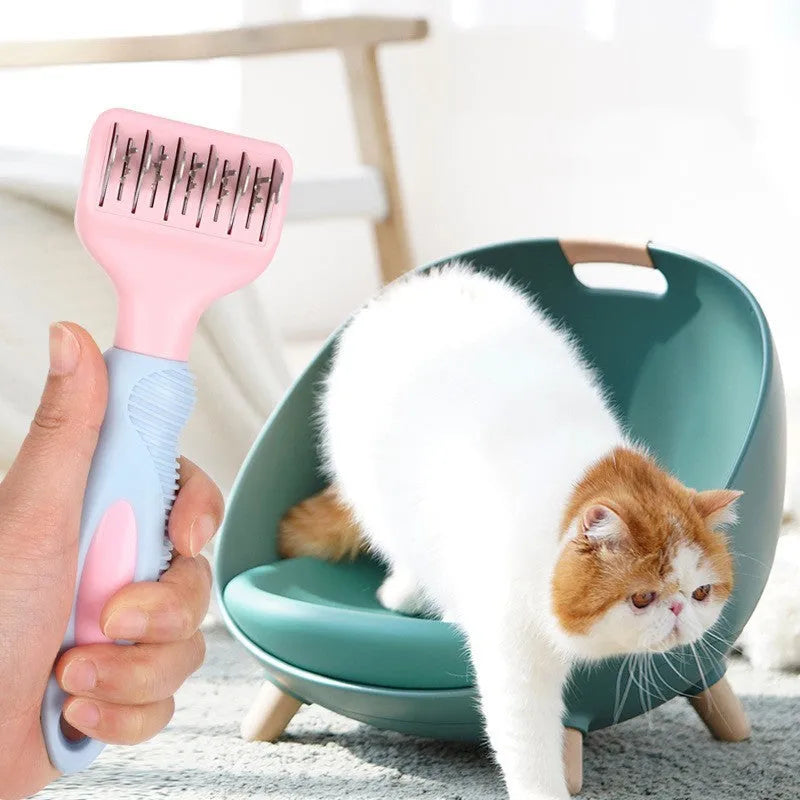 Pink pet grooming comb with stainless steel knot knife and massage brush tips measuring 170mm