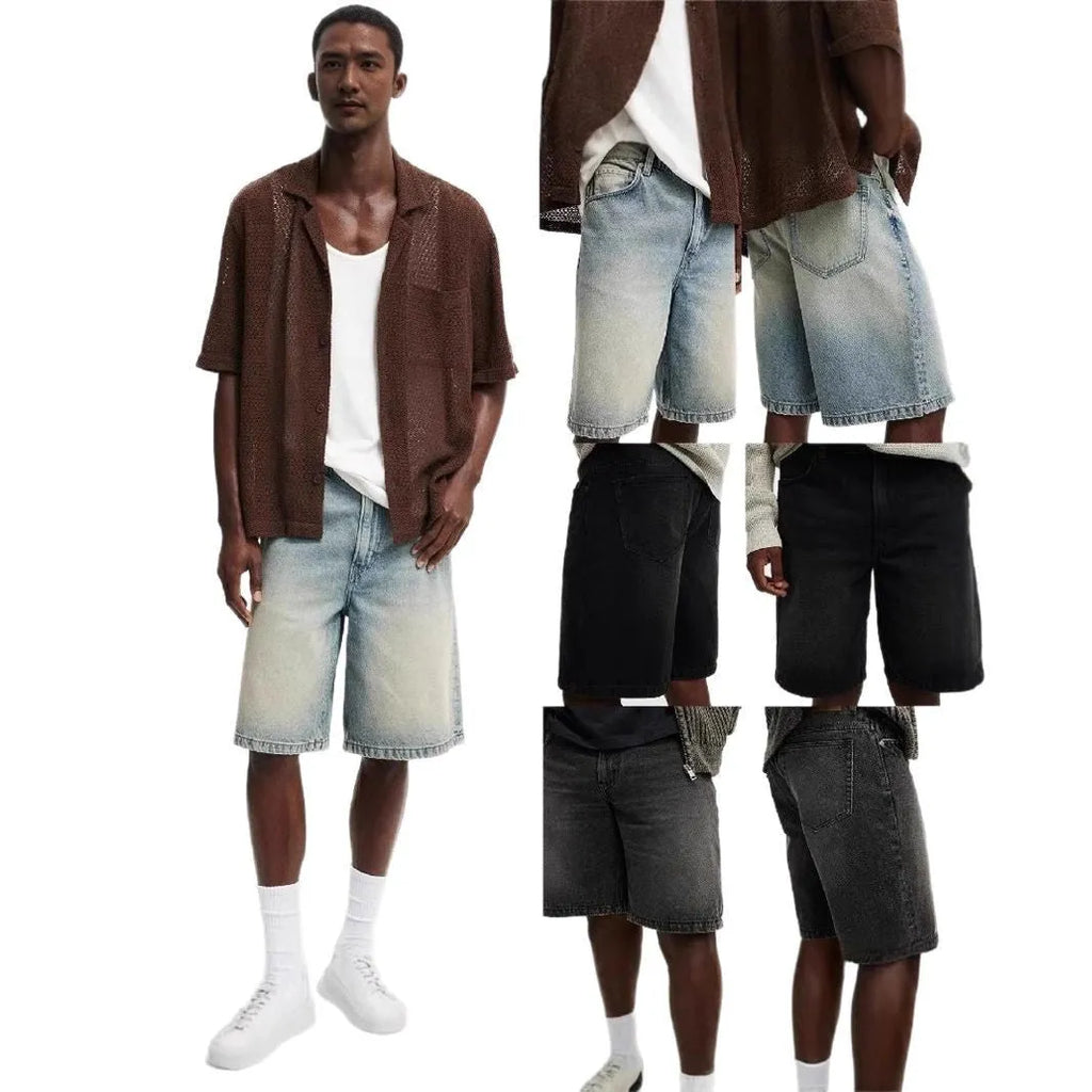 Men's loose fit light blue cotton denim straight leg trousers on a neutral background