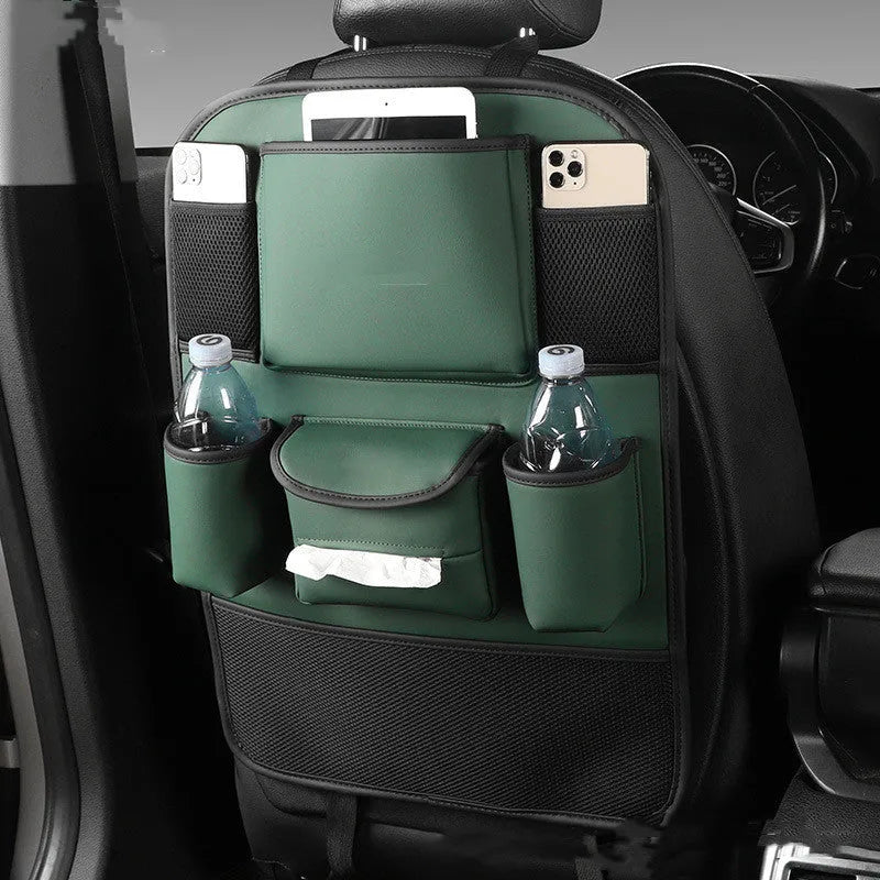 Leather car seat back storage bag in black, hanging behind a car headrest.