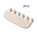 White PVC urine blocking splash guard for toilet training, shown on a toilet seat.