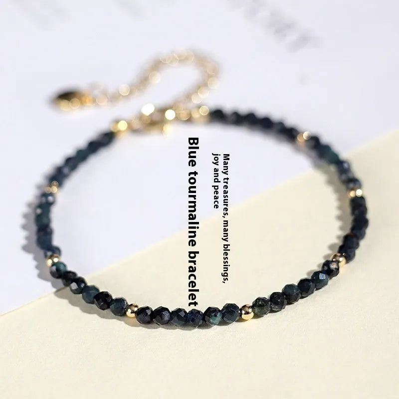 Blue tourmaline beaded bracelet with 3mm stones and spacer bead sections