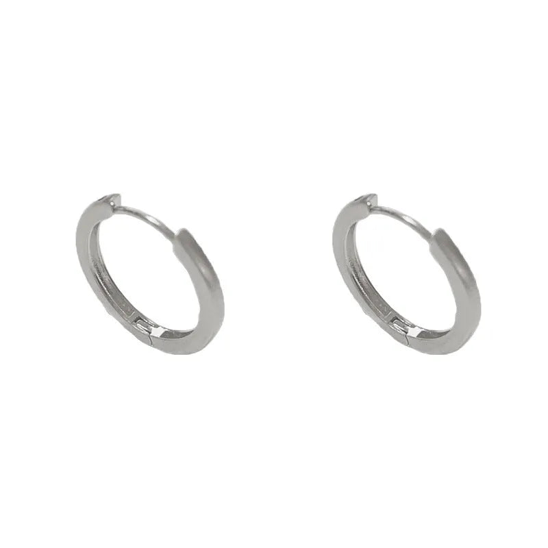 Geometric round women's ear clip with real gold plating in gold and silver colour options