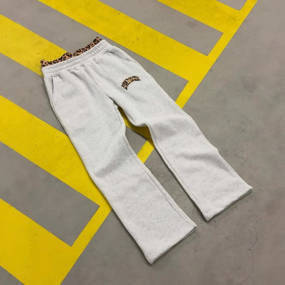 Men's loose fit hip hop trousers with double waist patchwork design and elastic polyester fabric