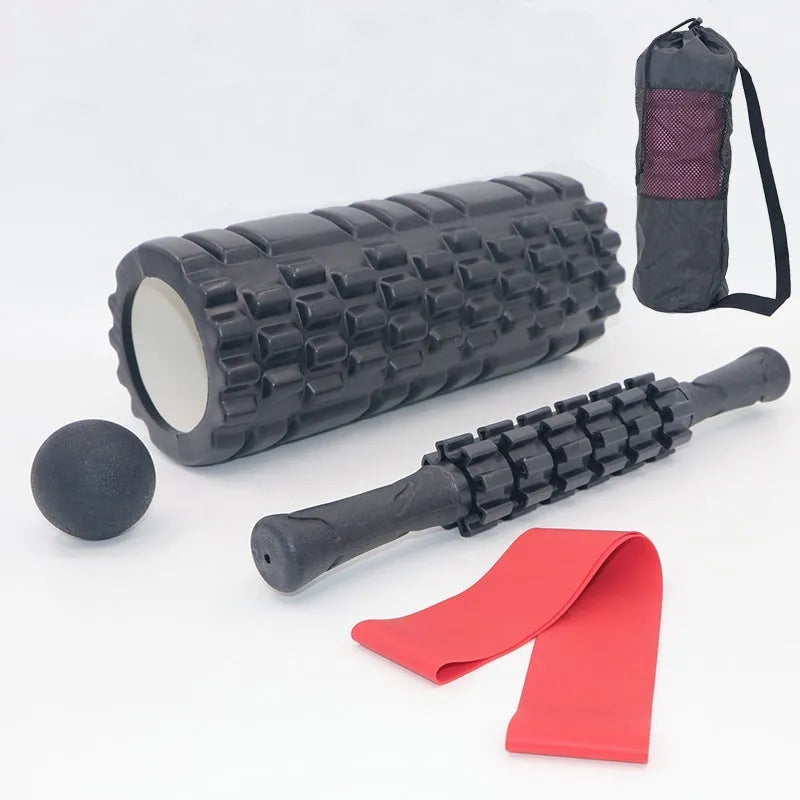 Black fitness foam roller massage stick measuring 33cm in length.
