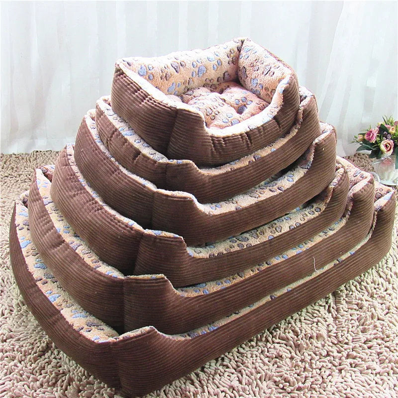 Beige plush sofa-style dog bed with raised sides for a small dog