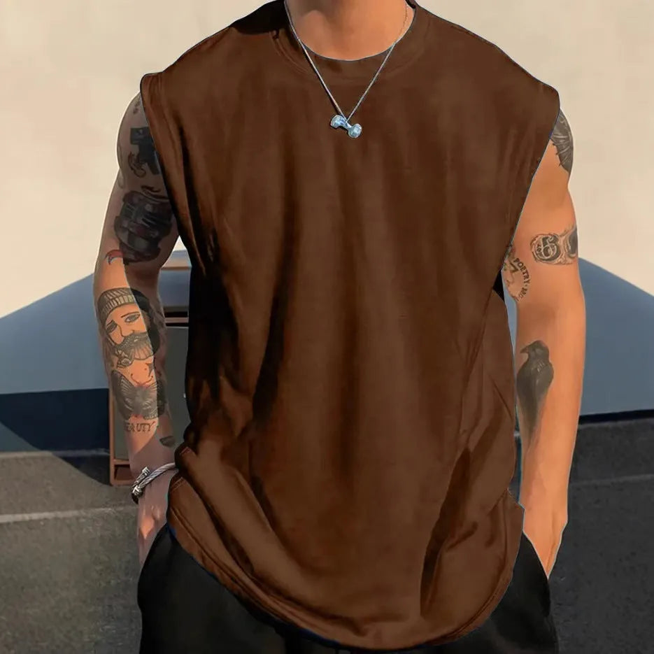 Men's loose fit solid colour cotton tank top shown in a selection of available colours and sizes.