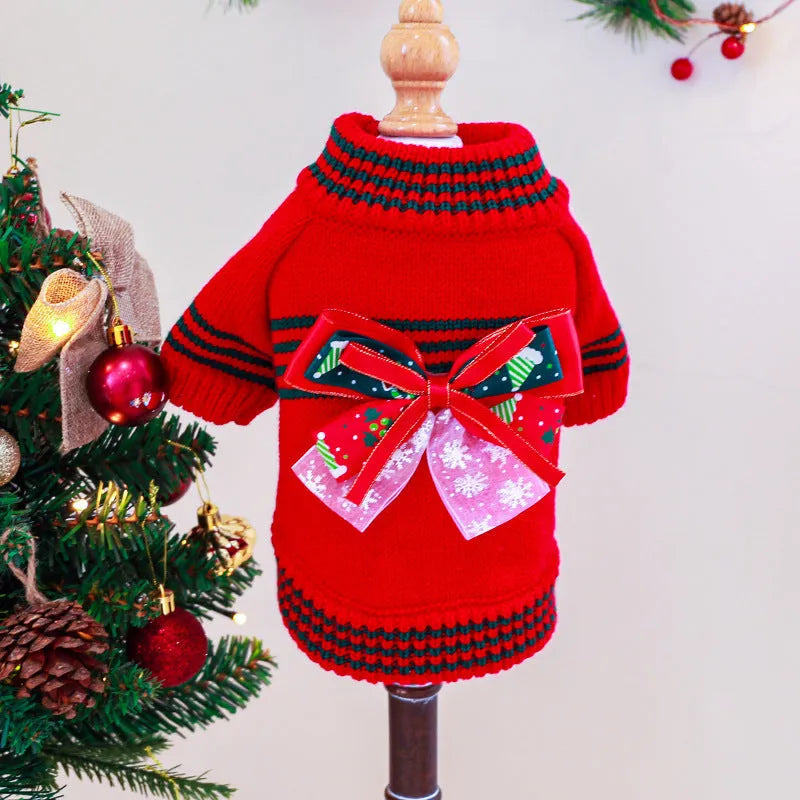 Red Christmas jumper for a small dog on a festive background