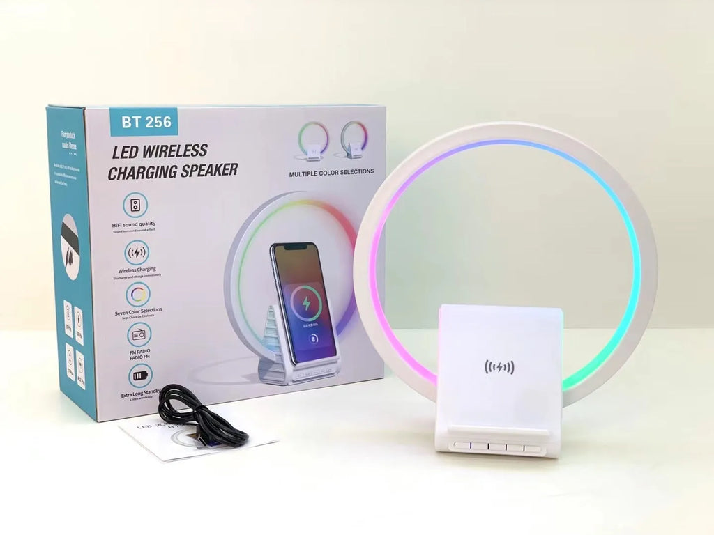 White smart Bluetooth speaker with LED ambience light and wireless charging surface