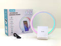 White smart Bluetooth speaker with LED ambience light and wireless charging surface