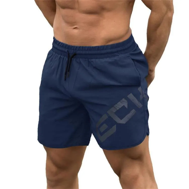 Men's elastic knee-length training shorts in quick-drying chemical blend fabric shown in black colour