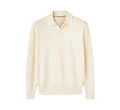 Man's milky white pure wool polo sweater with a lapel collar, shown in a loose fit.