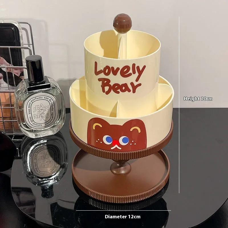 Beige rotating cosmetic brush storage barrel with 18-litre capacity on a table.