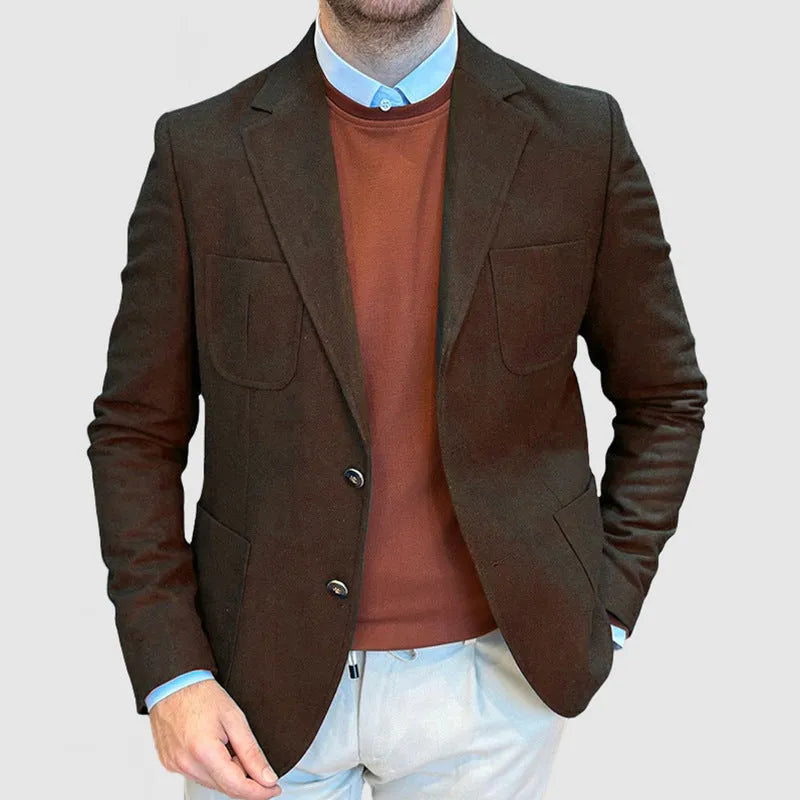 Man wearing a loose-fit army green cotton retro suit jacket, showing front and side details.