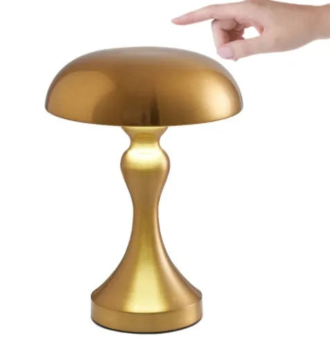 LED desk lamp in bronze finish with USB charging cable and touch controls for three colour temperatures