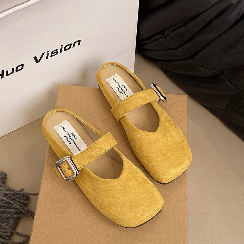 Women's flat closed toe slippers in apricot colour with square head and rubber sole.