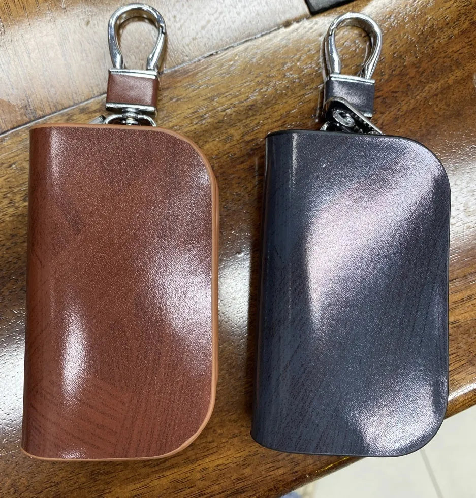 Black frosted genuine leather car key case showing inner compartment dimensions