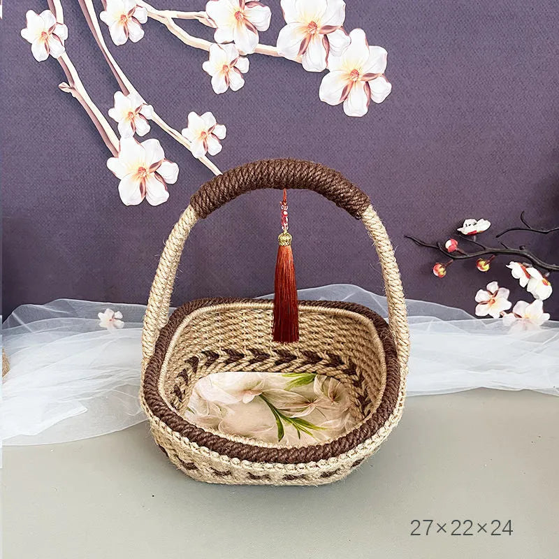 Hand-woven natural straw basket in a light brown colour, measuring 19cm by 12cm.