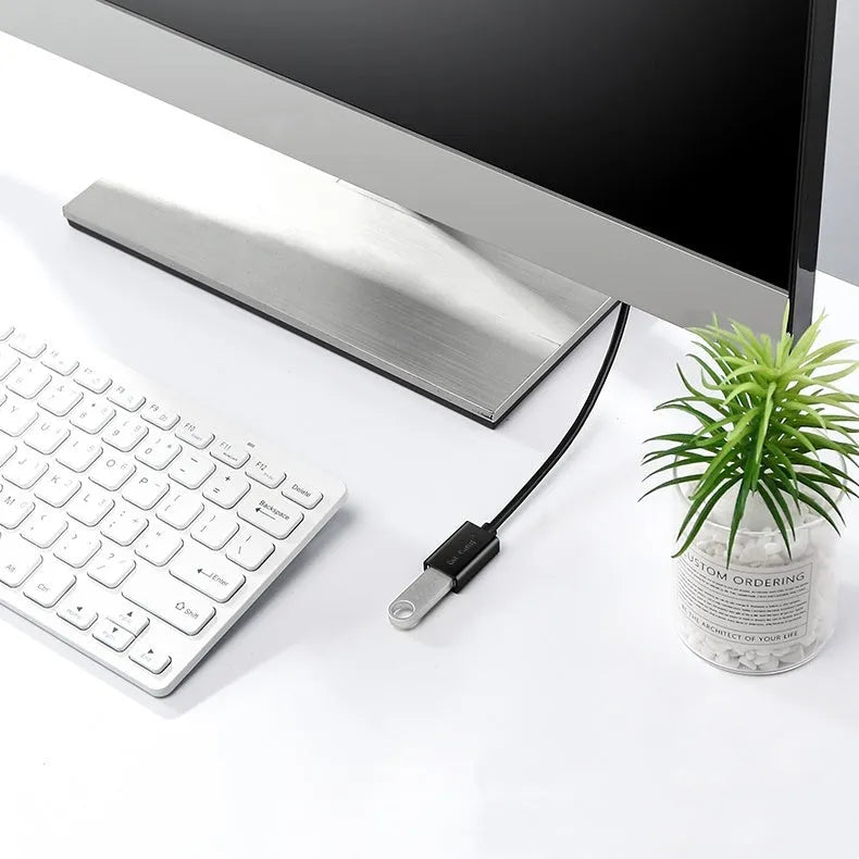 Black USB extension cable with male and female connectors showing shielded design for data transfer