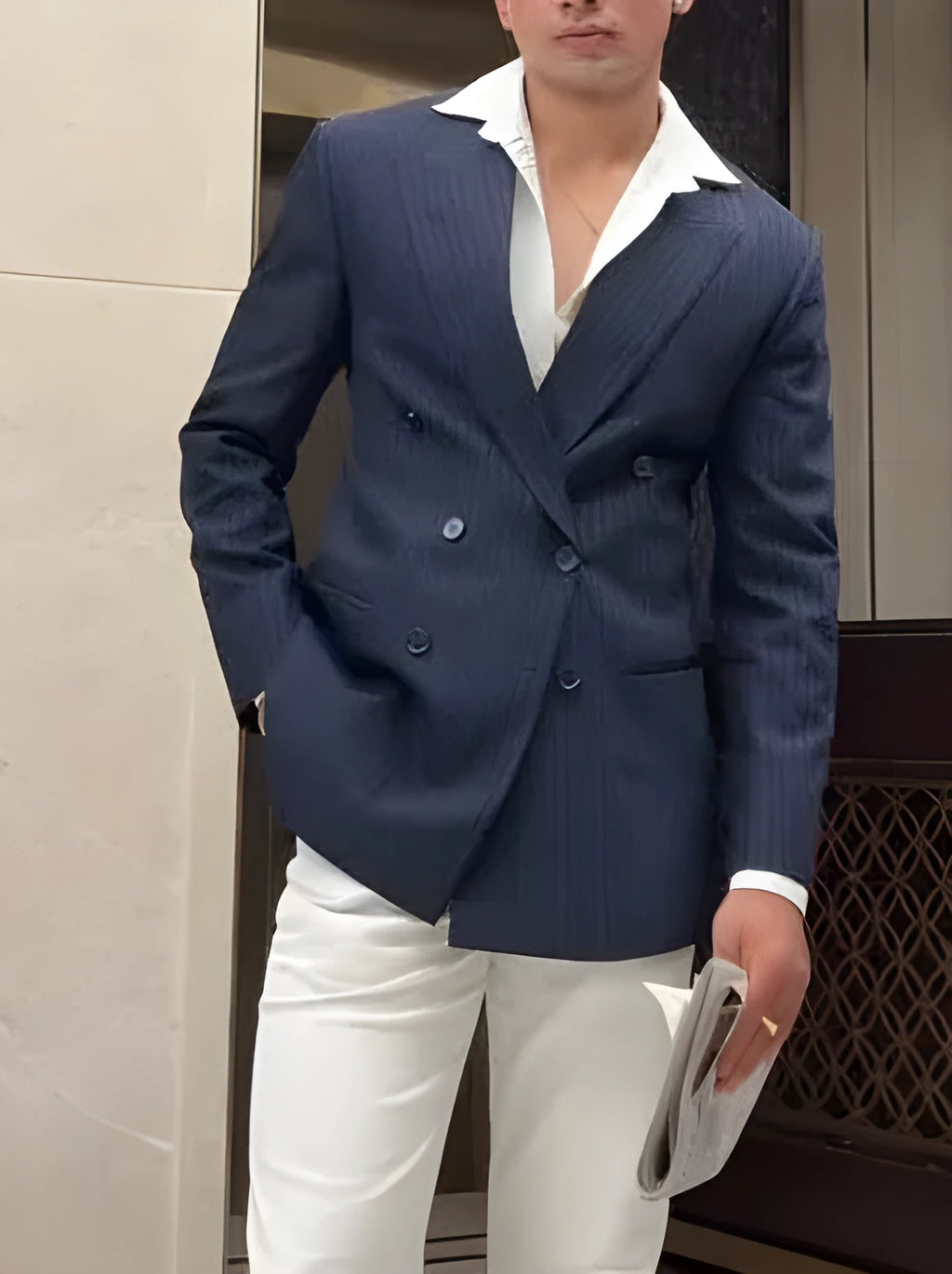 Men's classic striped double-breasted blazer on a hanger, regular fit.