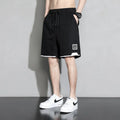 Boys plus size cotton shorts in black, khaki or white, showing mid-waist and shorts length design.