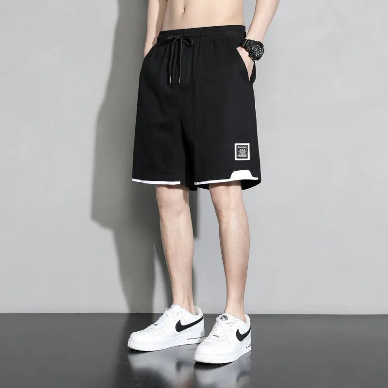 Boys plus size cotton shorts in black, khaki or white, showing mid-waist and shorts length design.