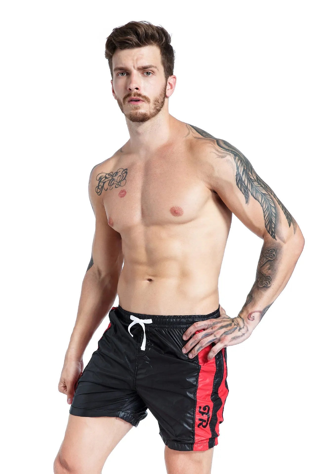 Men's blue lace-up sports shorts with slim fit and removable padding on athletic background