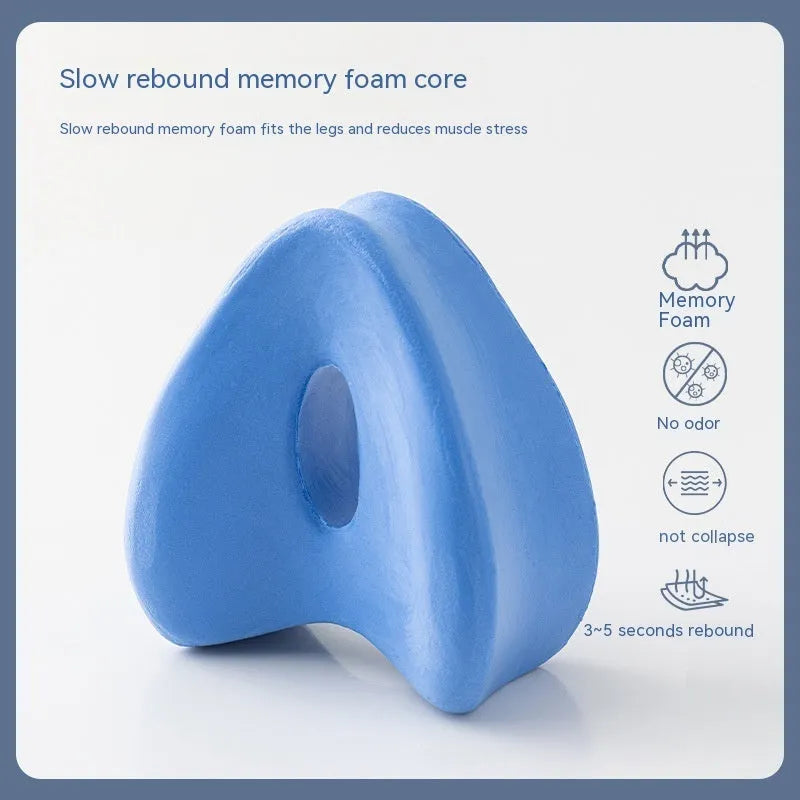 Heart-shaped dark blue memory foam leg pillow measuring 25x23x13cm for adult use