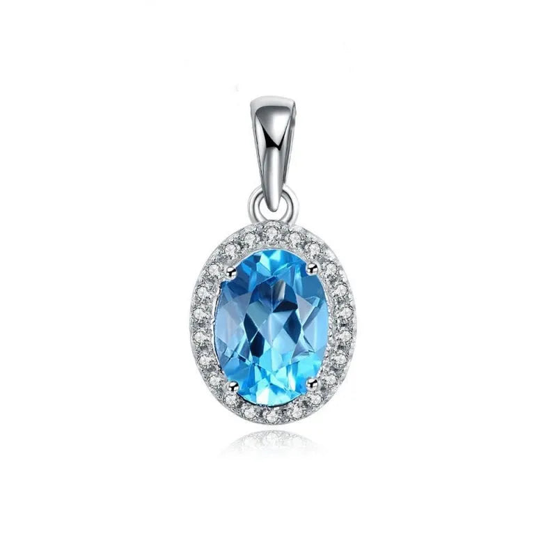 925 sterling silver jewellery set with Blue Topaz stones in geometric design including earrings, ring, pendant and necklace