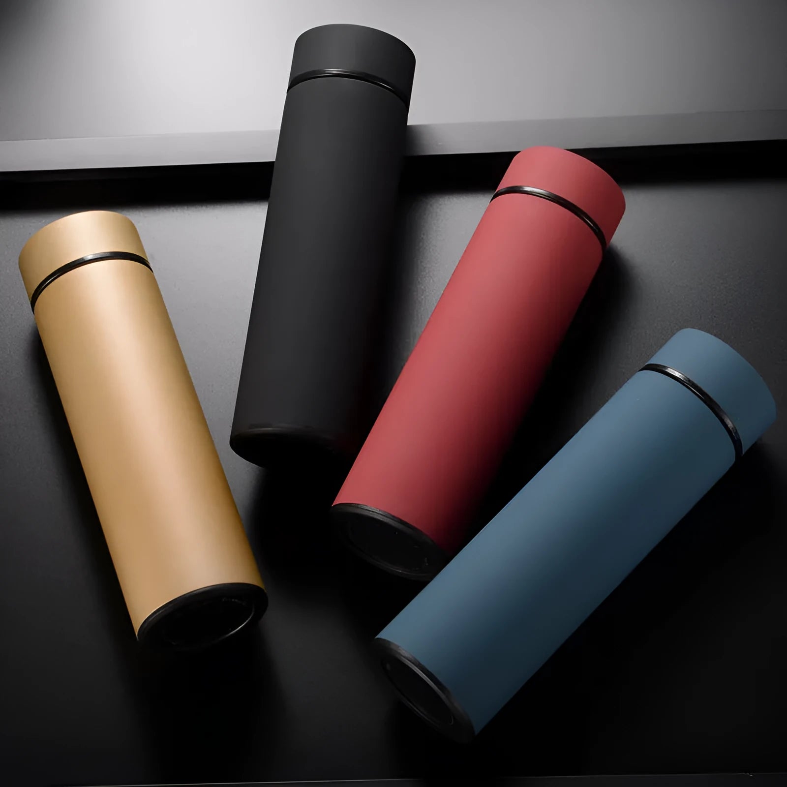 Black stainless steel water bottle with double wall vacuum insulation and arrow mouth, 450ml capacity.