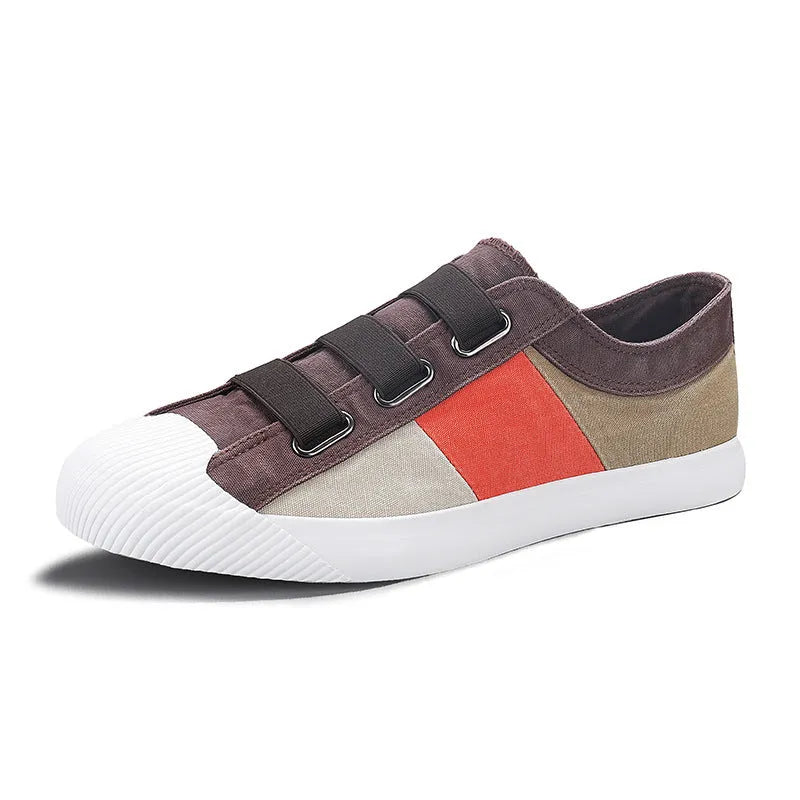 Men's low-top canvas sneakers in beige with colour stitching and an elastic band closure.