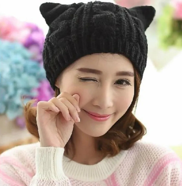 Hand made 3D knitted cat ear winter beanie in wool, shown in multiple colour options