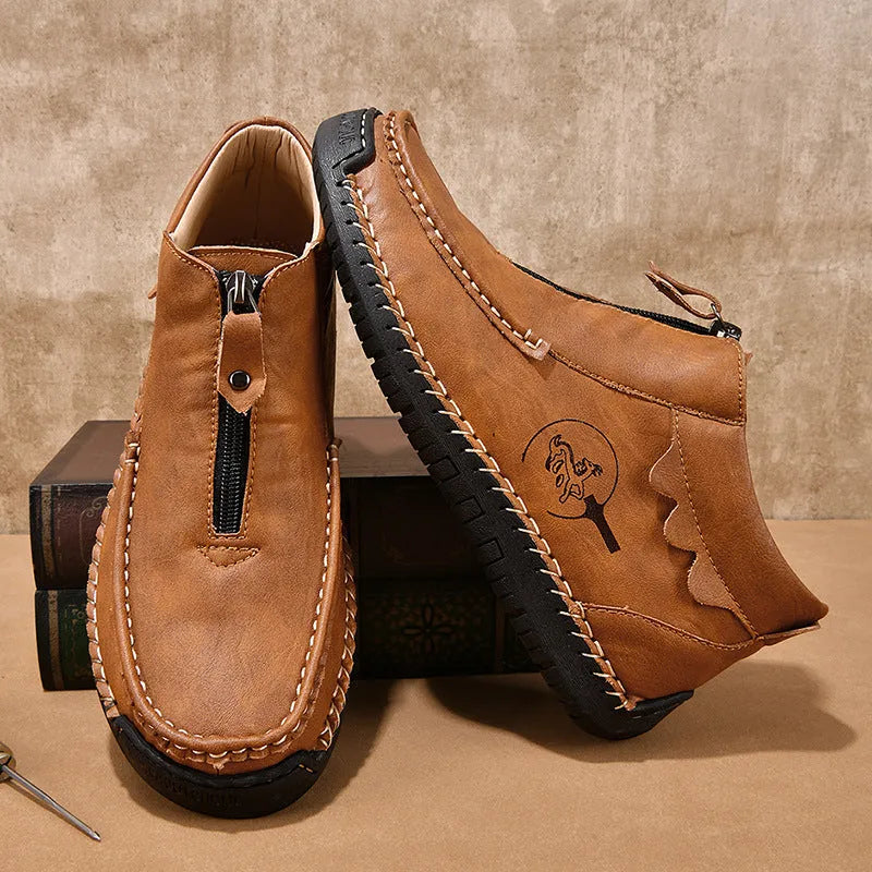 Men's black slip-on loafers with rubber soles and round toe design